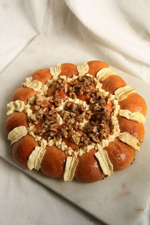 
                  
                    Load image into Gallery viewer, Brioche Wreath - MKT Holiday Collection The Daily Knead Candied Walnut Cinnamon Wreath Midi 
                  
                