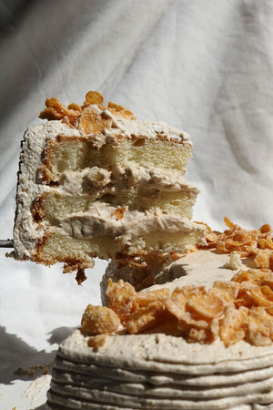 
                  
                    Load image into Gallery viewer, Cereal Milk Cortado Cake - Same Day Sweet The Daily Knead Slice 
                  
                